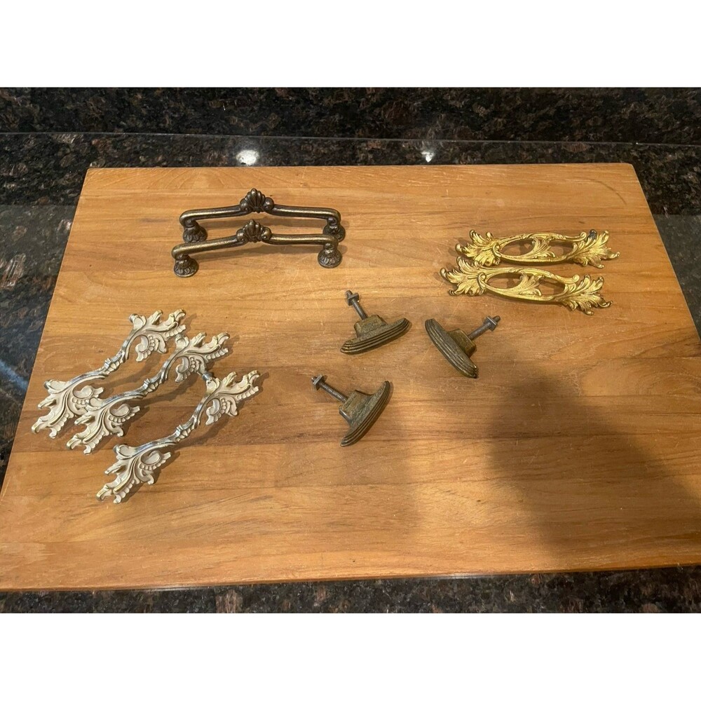 10 assorted and vintage cabinet pulls.